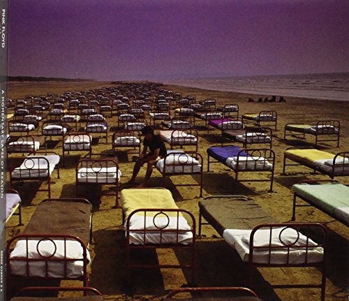 "CD case cover with a beach scene featuring rows of metal-framed beds in the sand."