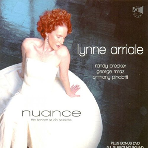 Jazz album cover featuring a woman in a white dress sitting on a round surface.