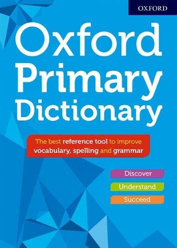 Blue book cover with "Oxford Primary Dictionary" in white text and geometric patterns.