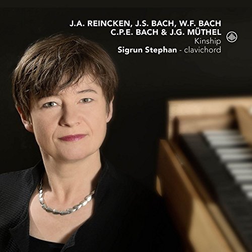 "CD cover featuring a woman with short brown hair and a clavichord."