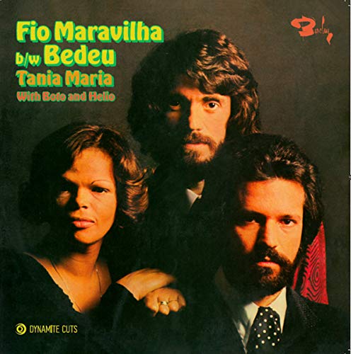 Vinyl record cover featuring three people, a woman and two men, with text.