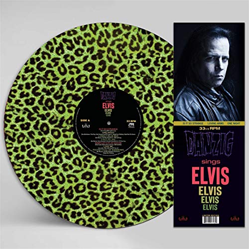 Vinyl record with green leopard print and black label, accompanied by album cover.