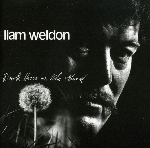 "Liam Weldon's album cover, a black-and-white image of a man and dandelion."