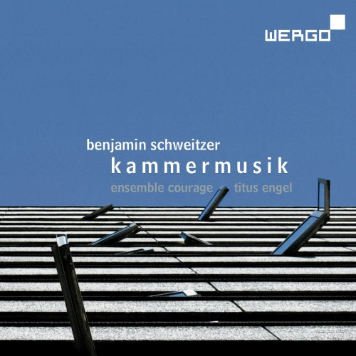 "CD cover featuring a blue sky and metal grating with bent bars."