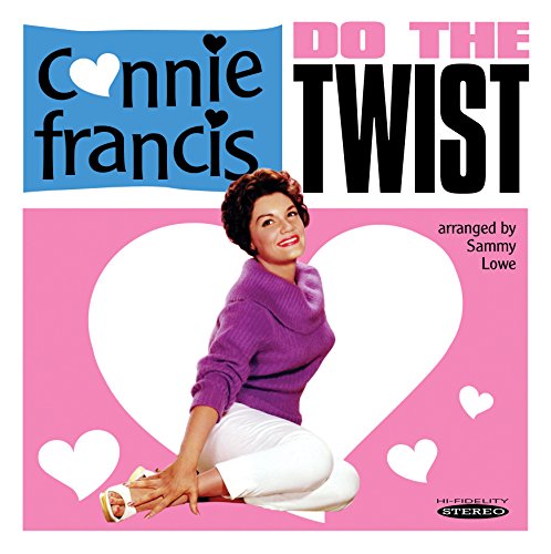 "Album cover with Connie Francis sitting in a heart, wearing purple and white."