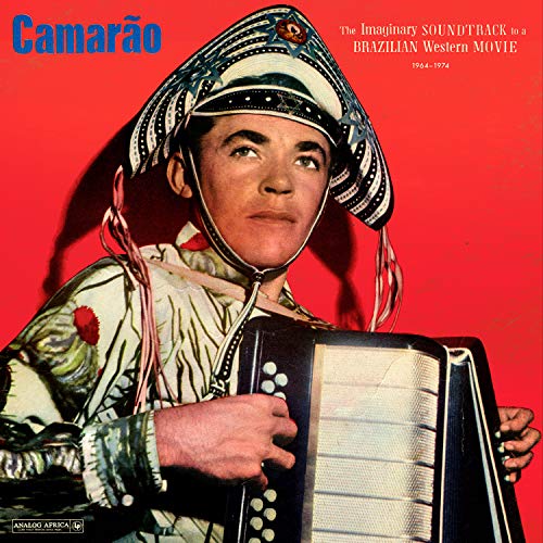 "Album cover with man in ornate costume holding accordion against a red background."