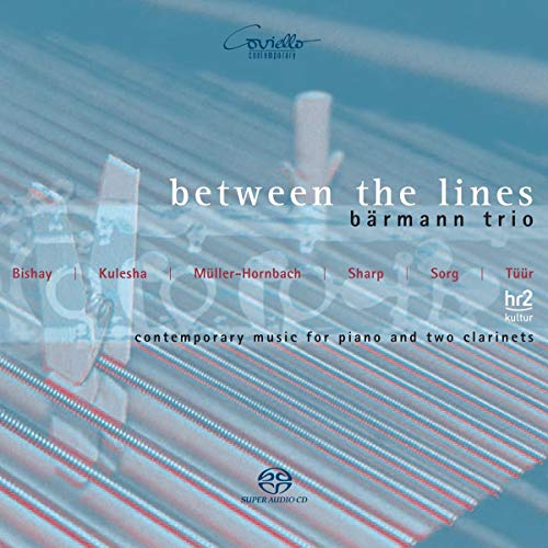 A CD cover featuring piano keys and clarinets, with text "between the lines".