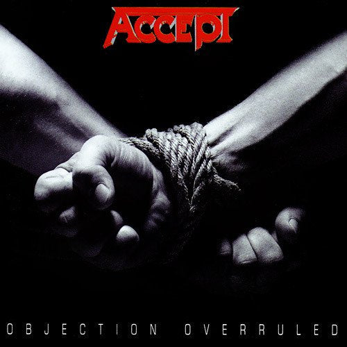 "Album cover with bound fists and red 'Accept' logo on black background."