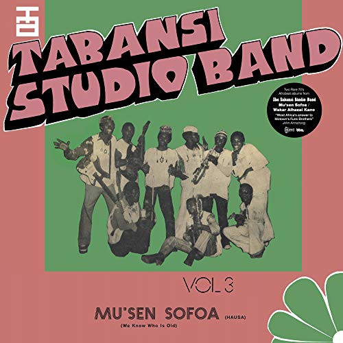 "Album cover with band members, green and red background, and bold pink title."