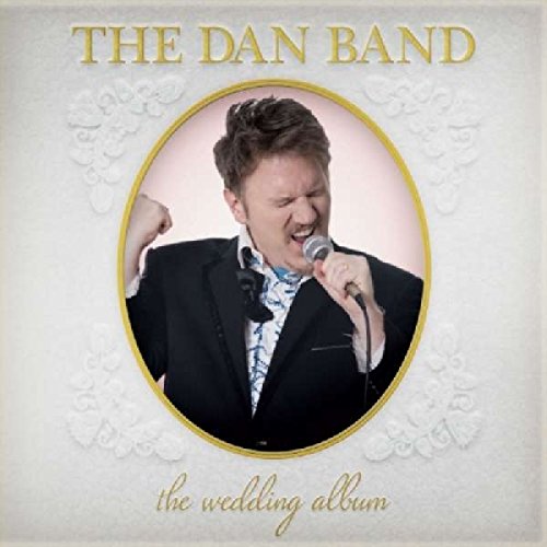 "Album cover with man in tuxedo holding microphone, surrounded by gold frame and text."