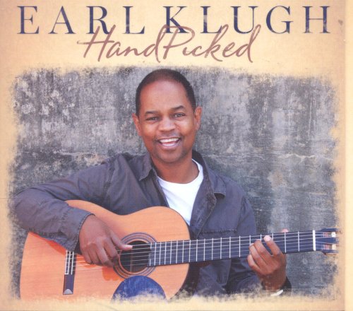 "Earl Klugh album cover with man holding guitar against a gray wall."