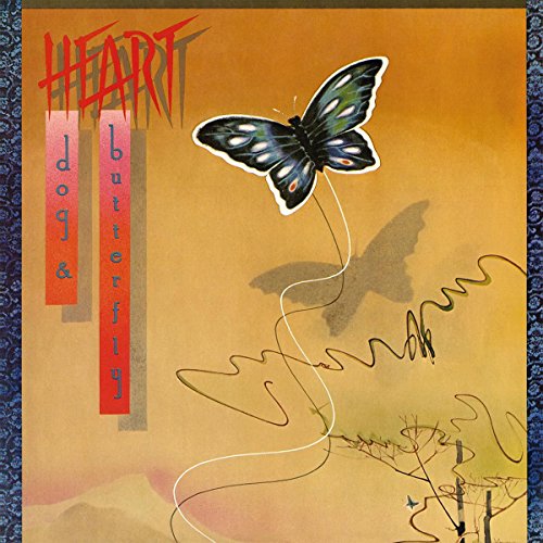 Album cover featuring a girl tied to a butterfly with a red and orange background.