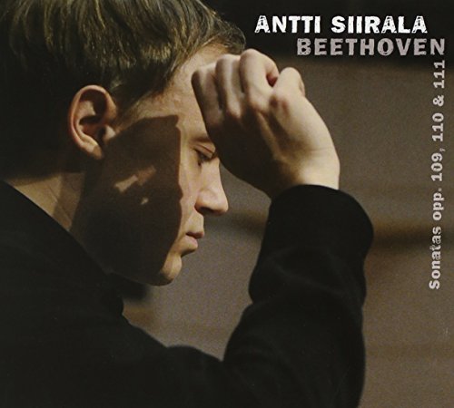 CD cover with a man in black, hand on forehead, and white text.