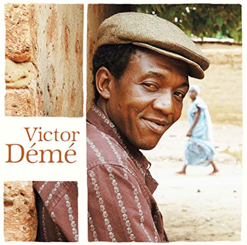 "Album cover with a man wearing a hat and patterned shirt."