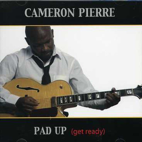 Album cover featuring a man playing a guitar, with black borders and text.