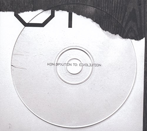 CD partially torn from white paper, with "KON:SP]UTiON TO: E]VOL]UTiON" text on its surface.