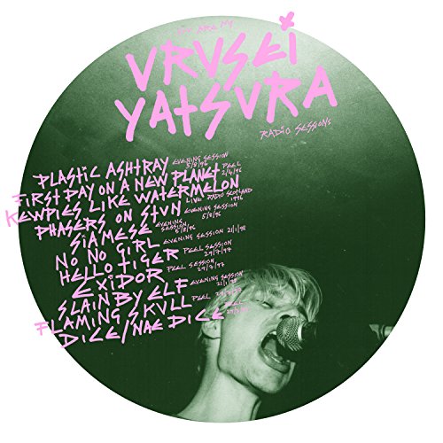 "CD cover with a woman singing into a microphone and pink handwritten-style text."