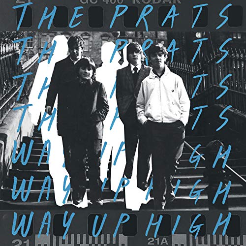 "Black and white album cover with four men walking on a staircase."