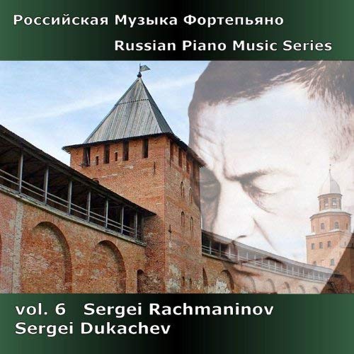 The image is a CD cover featuring a man's face and a brick building. alt text: "CD cover with man's face and red brick building."