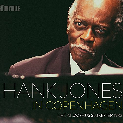 "CD cover featuring a close-up of Hank Jones playing piano."