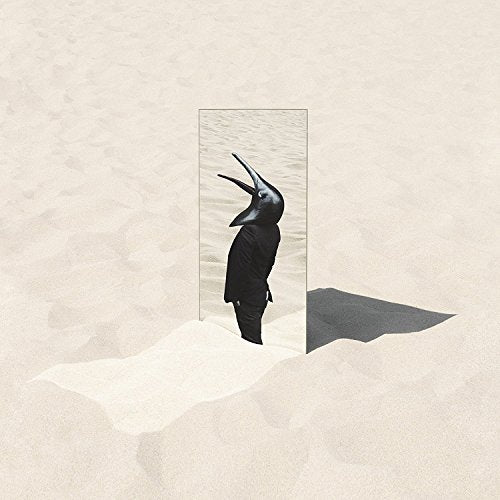 A vinyl record cover featuring a black bird-like figure emerging from a rectangular portal.