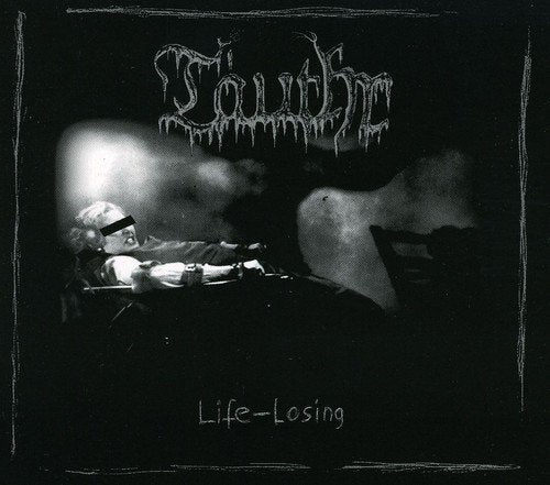 Black and white album cover with a man lying on a bed.