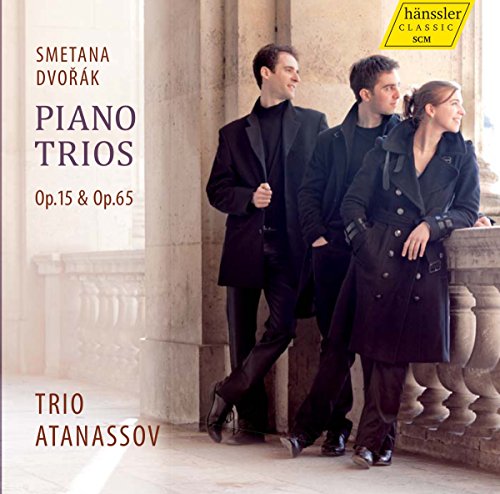 CD cover with three musicians in black standing by a stone balcony.