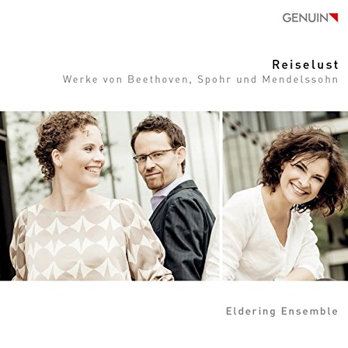 "CD cover with three musicians, smiling, in formal attire, against a white background."