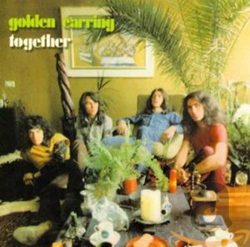 "Golden Earring album cover with four band members in a room surrounded by plants."