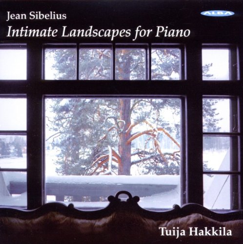 "CD cover with a snowy tree scene viewed through a dark window frame."