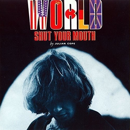 "Album cover with 'WORLD SHUT YOUR MOUTH' text and a person's head in shadow."