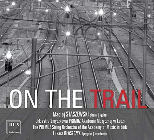 "CD cover with train tracks image and 'ON THE TRAIL' text."