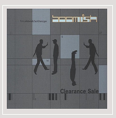 The image depicts a CD cover with a gray grid background and silhouetted figures. For accessibility purposes, a suitable alt text could be: "Gray CD cover with silhouetted figures and 'Boomish' title."