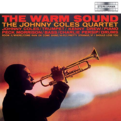 CD cover featuring a man playing trumpet against a colorful sunset background.