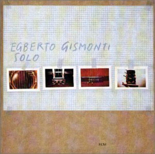 "CD cover with grid background, four small photos, and handwritten title 'Egberto Gismonti Solo'."