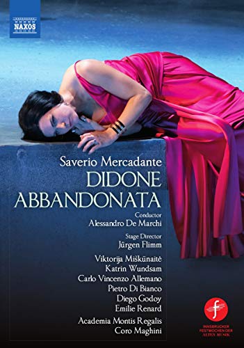 The image is a DVD cover for "Mercadante: Didone". The alt text is: "Woman in pink dress lying on a stone, opera DVD cover."
