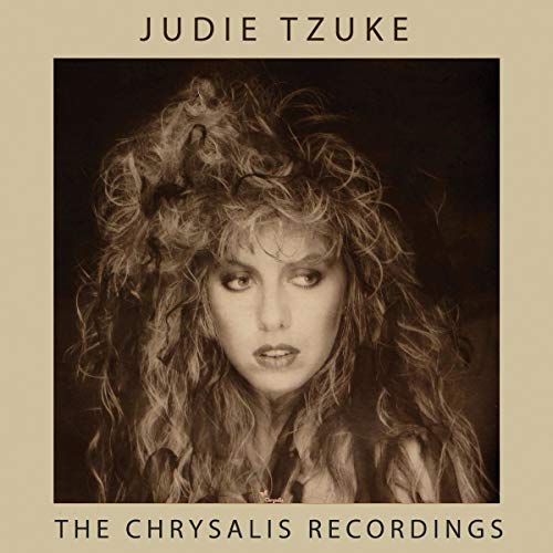 The image is a sepia-toned album cover featuring a woman with curly hair and the title "The Chrysalis Recordings".