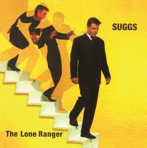 Man in black suit on stairs, with shadowy duplicates, on yellow album cover background.