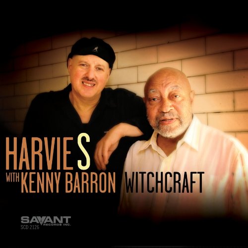 Album cover with two men standing against a brick wall, text overlay.