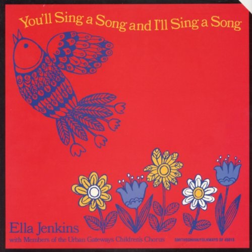 Red CD cover with blue bird and flowers, yellow and blue text.
