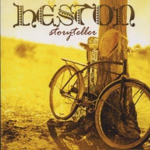 "Heston Storyteller" album cover featuring a bicycle leaning against a tree trunk.