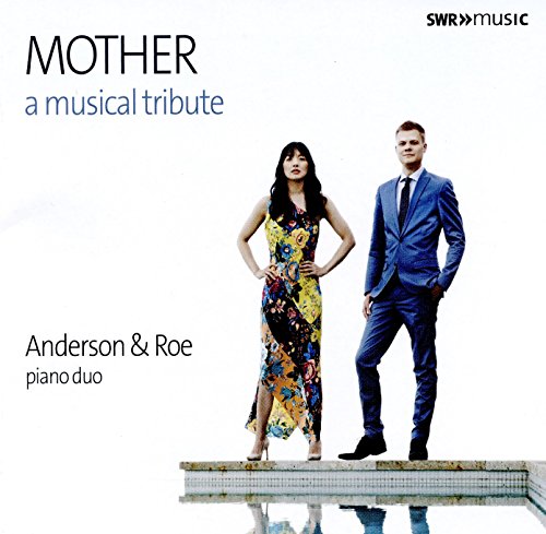"Album cover with a man and woman standing on a tiled edge."