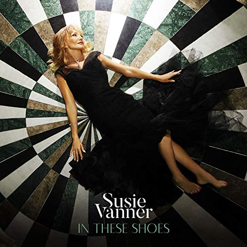 Album cover: Susie Vanner lying on a black and white spiral background.