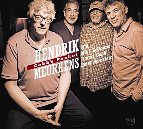 Album cover featuring four men posing together, with text overlay.