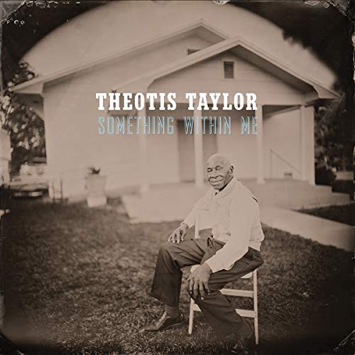 "Black and white vinyl album cover featuring an elderly man sitting on a chair outside a house."