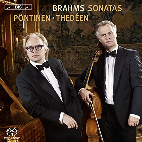 "CD cover featuring two men in tuxedos, one holding a cello, in ornate setting."