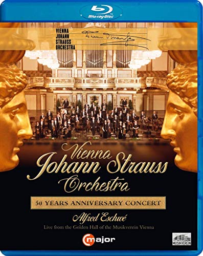 "Blu-ray case with gold statues and orchestra on stage, celebrating 50 years."