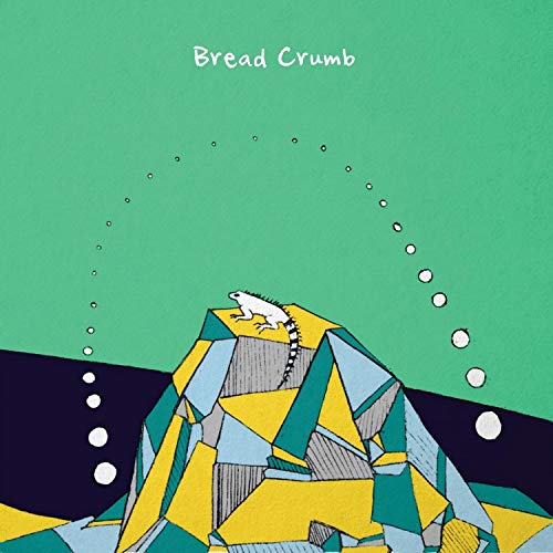 "Album cover with abstract mountain illustration and 'Bread Crumb' text on green background."