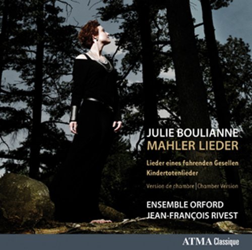 "CD cover featuring a woman in black standing in a forest, with text overlay."