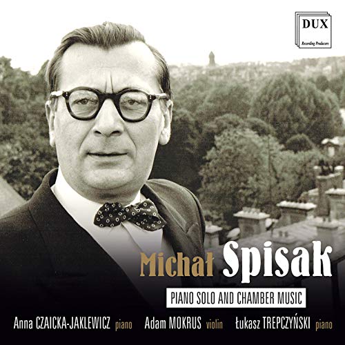 Black and white image of a man in a suit on a CD cover.